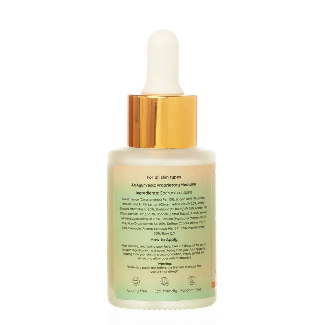 Back view of varnya daily glow face serum bottle from Green Studio Ayurveda on a white background