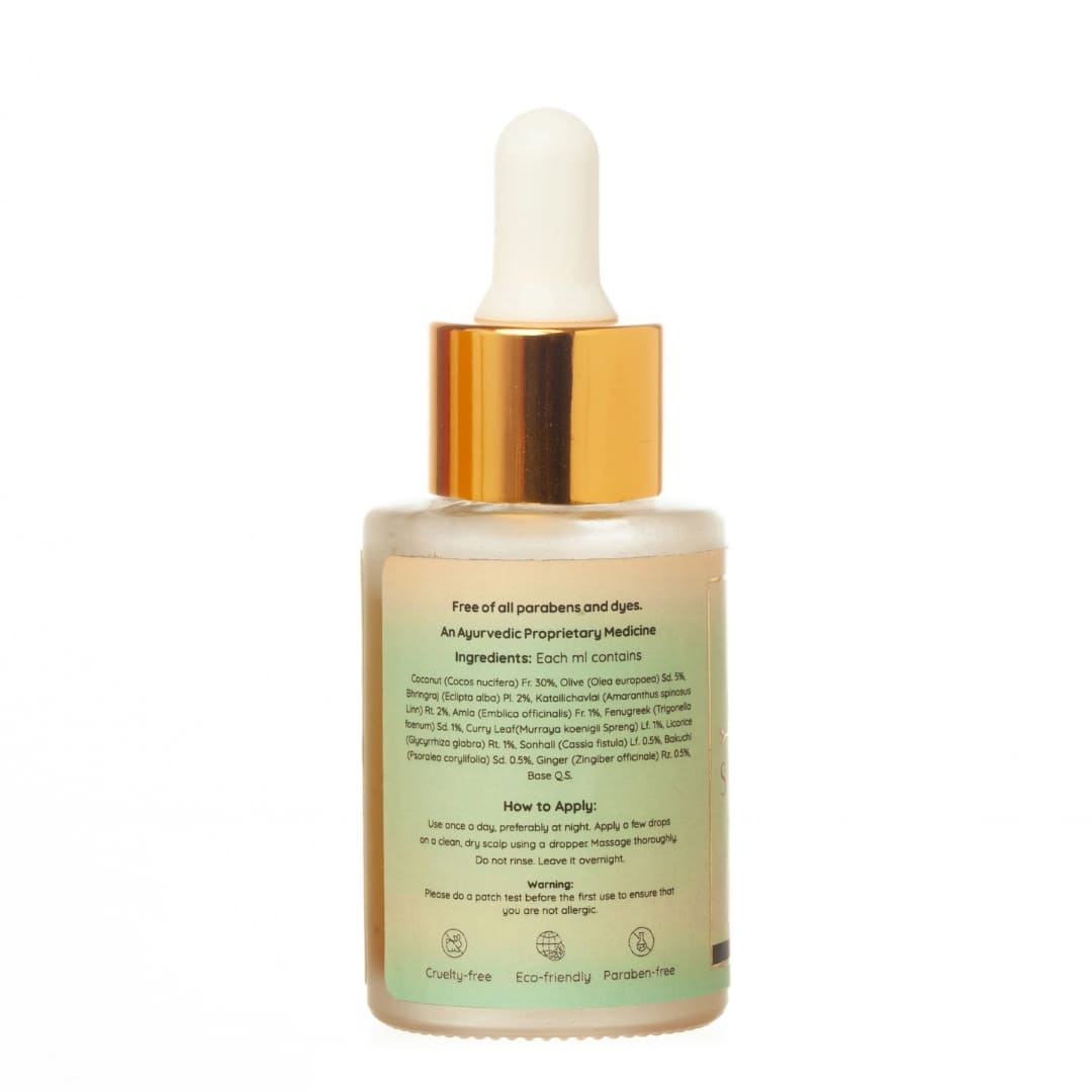 Back view of Sukeshya hair tonic bottle from Green Studio Ayurveda on a white background